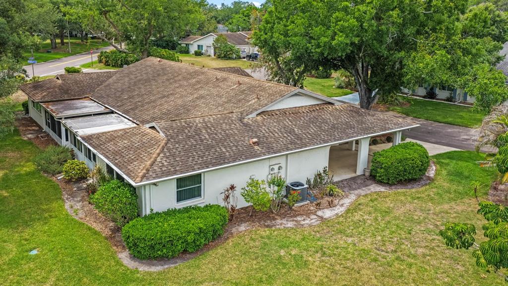 2034 Hawkhurst Circle, Unit 178 Sun City Center, FL 33573 - Photo 5 of 46 an aerial view of a house having yard