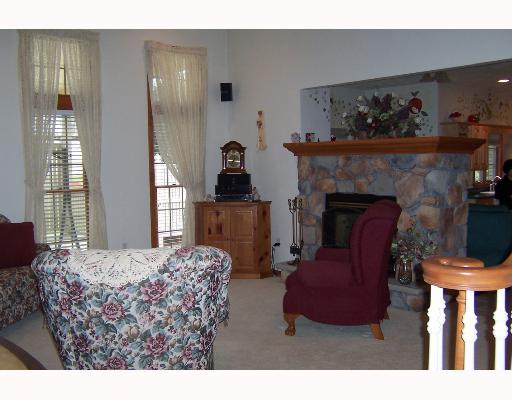 369 Fosterville Road Greensburg, PA 15601 - Photo 2 of 8 Living Room. Dramatic 2-story LR with double sided stone fireplace