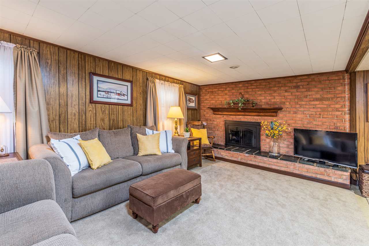 950 Cattle Scales Road Waynesboro, VA 22980 - Photo 36 of 50 a living room with furniture and a fireplace