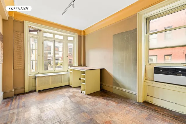 a room with window closet and windows