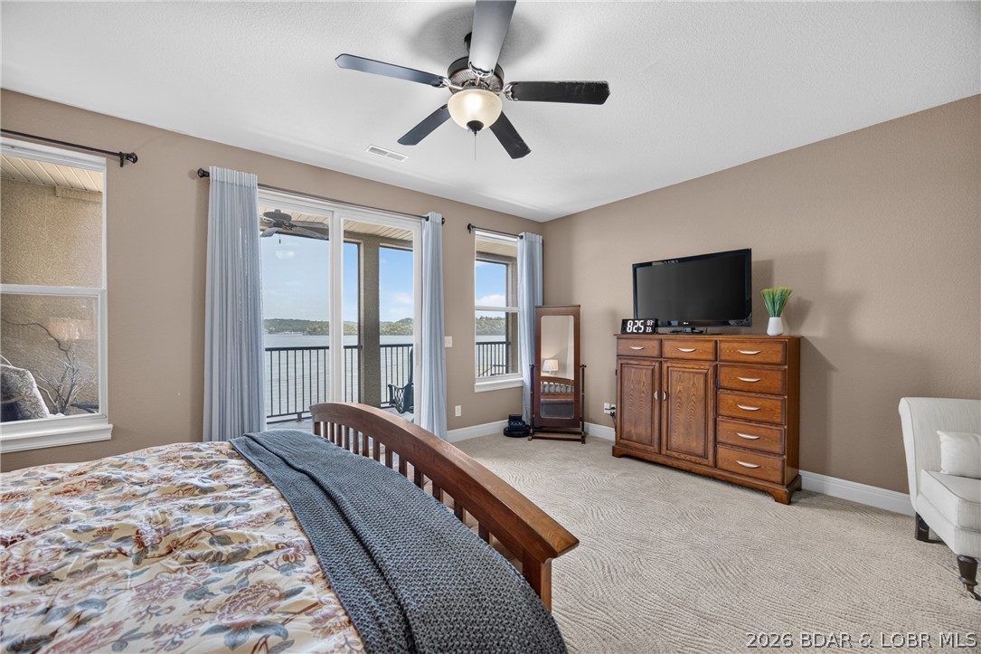 3168 Twin Rivers Point, Unit 2B Camdenton, MO 65020 - Photo 30 of 92 Master Bedroom's Sliding Glass Doors to 52 Ft Lake