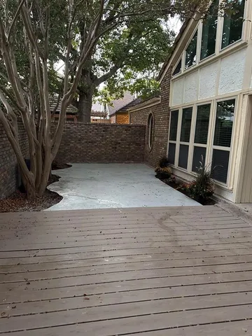 a view of a park with large trees