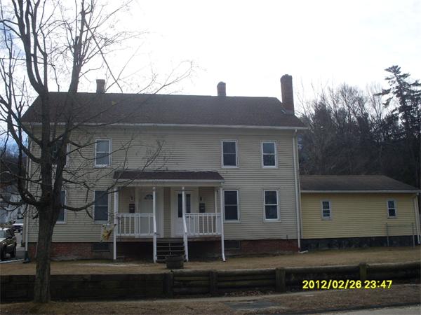 83-85 Springfield Street Three Rivers, MA 01080 - Photo 1 of 15 a view of a house with a street
