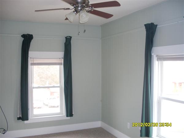 83-85 Springfield Street Three Rivers, MA 01080 - Photo 11 of 15 a view of an entryway with wooden floor and a window