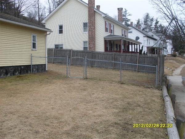 83-85 Springfield Street Three Rivers, MA 01080 - Photo 15 of 15 a view of house with a backyard