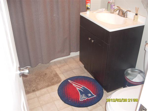 83-85 Springfield Street Three Rivers, MA 01080 - Photo 6 of 15 a bathroom with a sink vanity and toilet