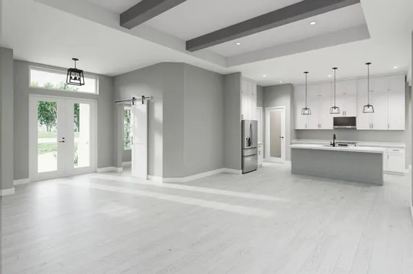 a view of a kitchen with a sink and a window