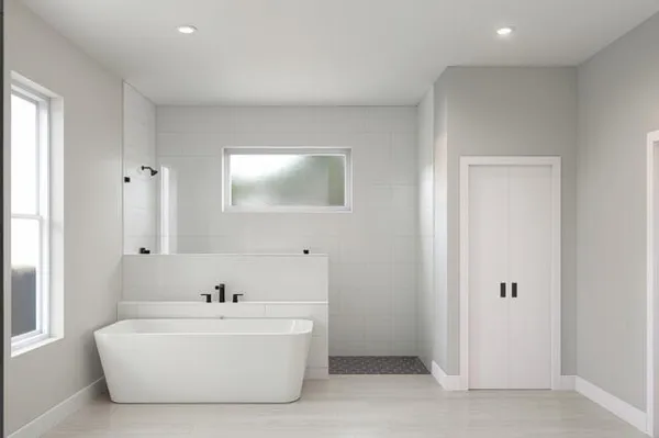 a bathroom with a bathtub and shower
