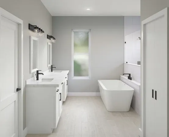 a bathroom with a sink mirror toilet and bathtub