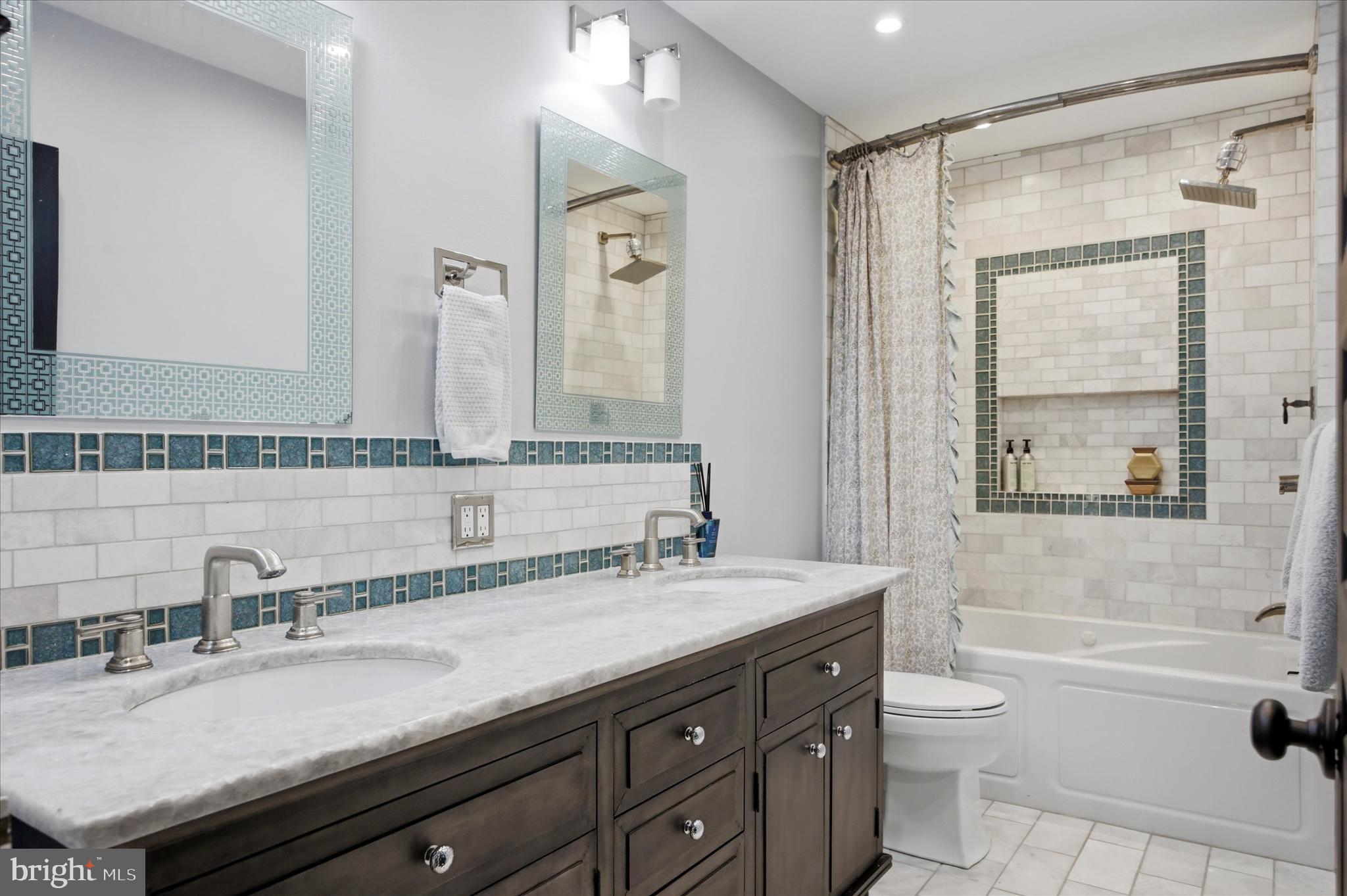 1237 Hagys Ford Road Penn Valley, PA 19072 - Photo 30 of 39 Updated Hall Bathroom with Dual Sink Vanities