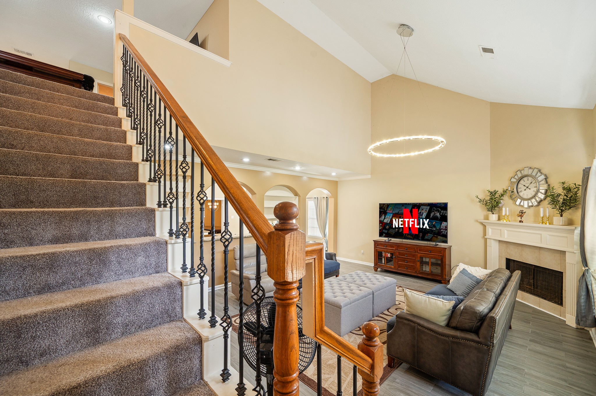 8111 Morningbrook Court Spring, TX 77379 - Photo 25 of 46 a living room with fireplace furniture and a flat screen tv