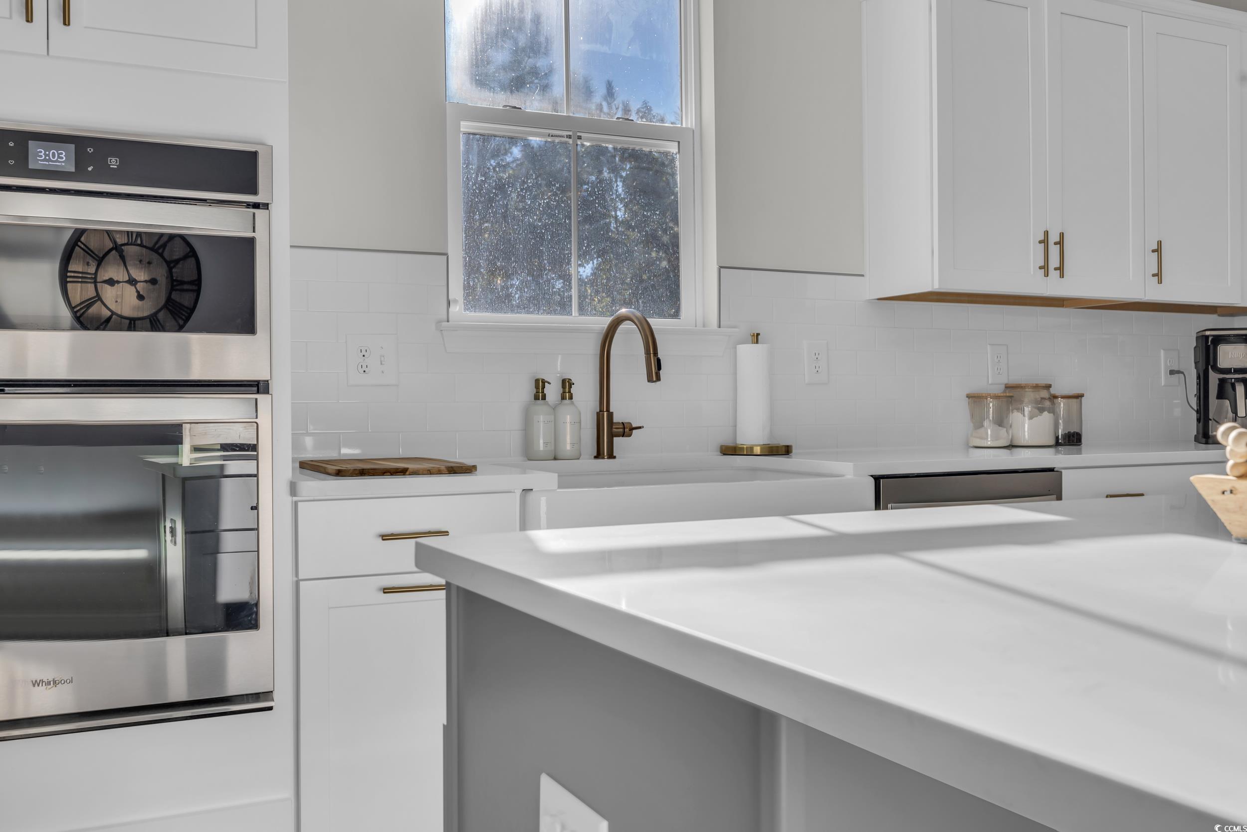 157 Tidal Drive Murrells Inlet, SC 29576 - Photo 12 of 36 Kitchen with stainless steel appliances, white cab