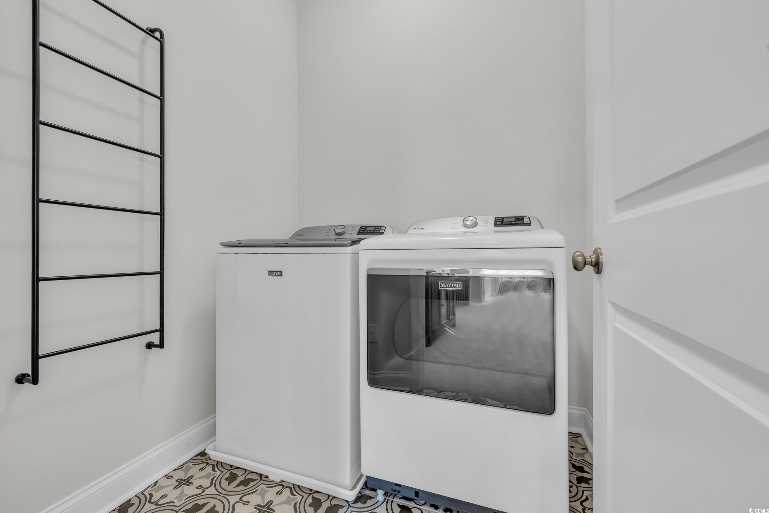157 Tidal Drive Murrells Inlet, SC 29576 - Photo 31 of 36 Laundry room featuring washer and clothes dryer