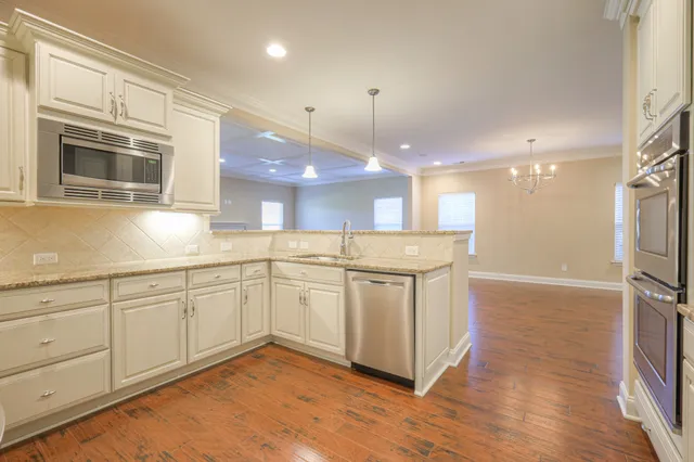 a view of a kitchen with a sink