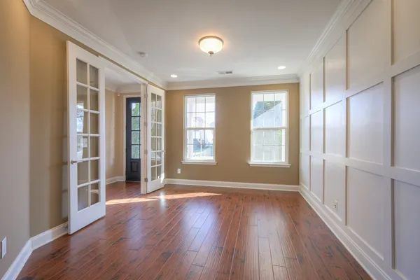 a bathroom with a toilet and shower