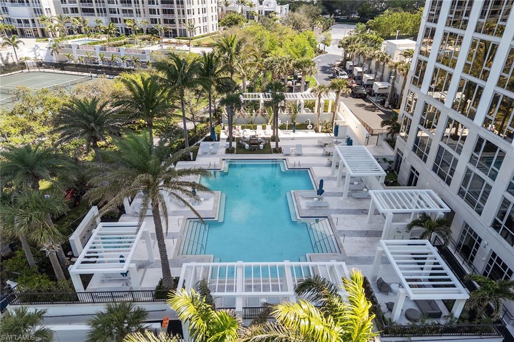 6897 Grenadier Boulevard, Unit 1202 Naples, FL 34108 - Photo 43 of 50 a view of a city with tall buildings