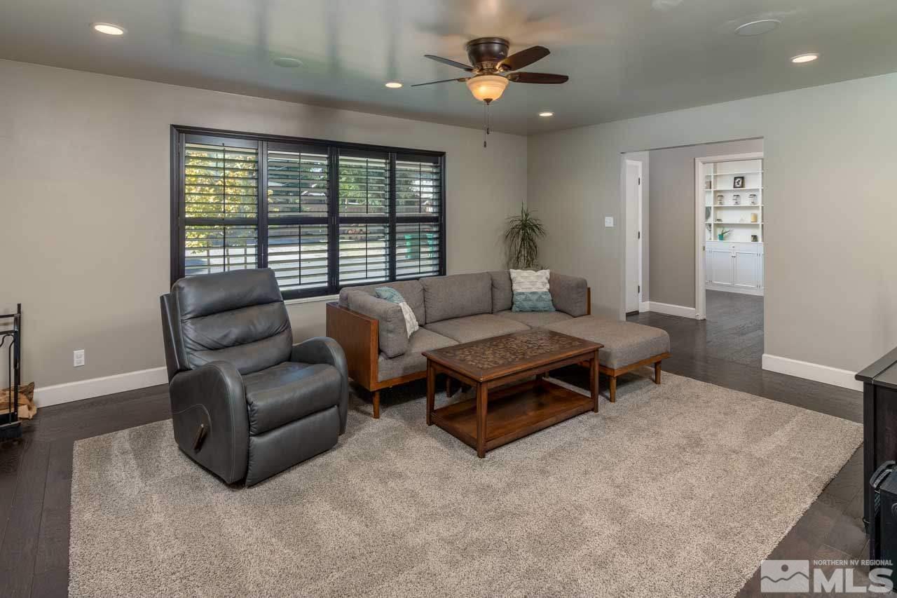 1445 Monroe Street Reno, NV 89509 - Photo 4 of 20 a living room with furniture ceiling fan and a window
