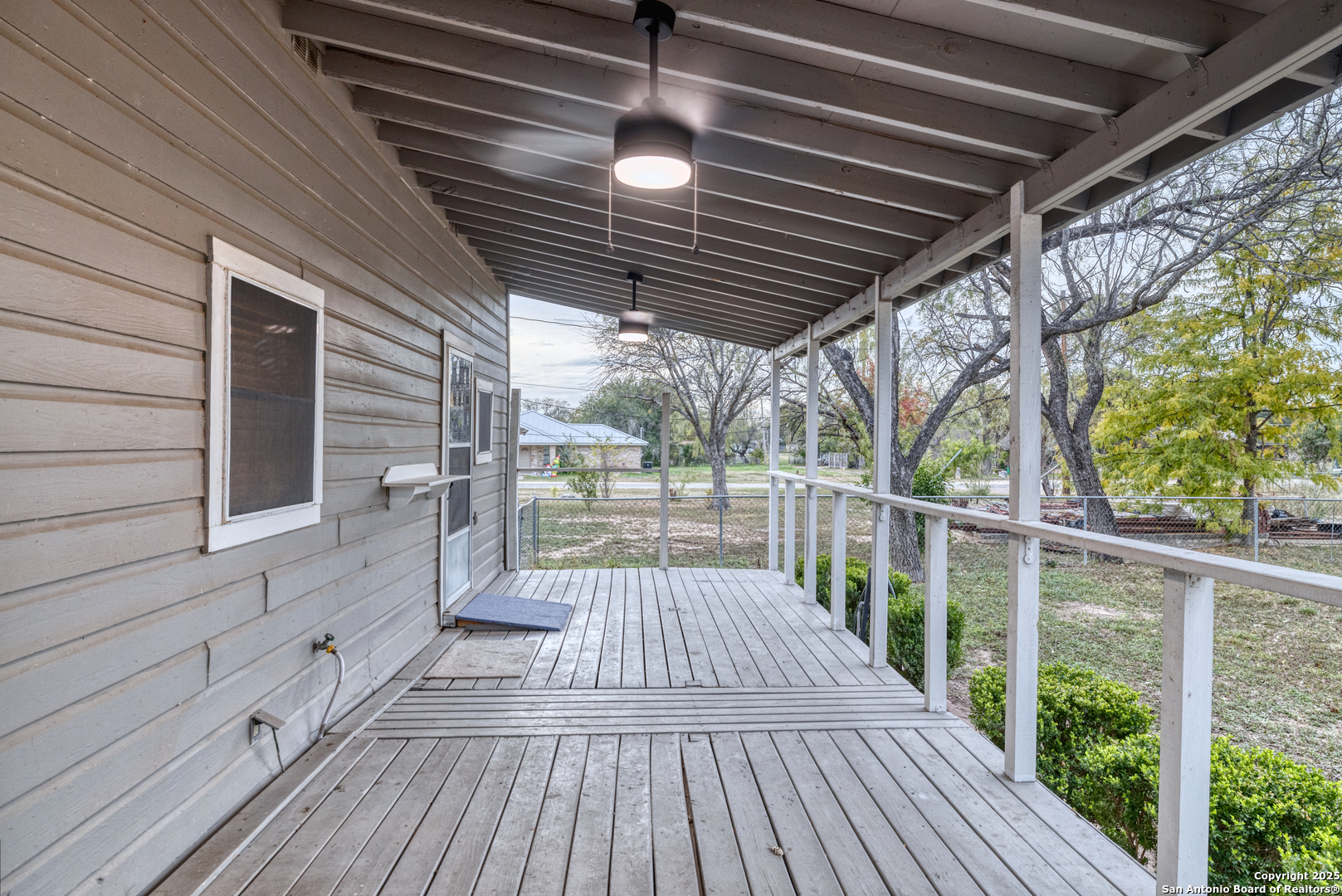 214 West Frio Street Uvalde, TX 78801 - Photo 22 of 35 a view of a balcony with wooden floor