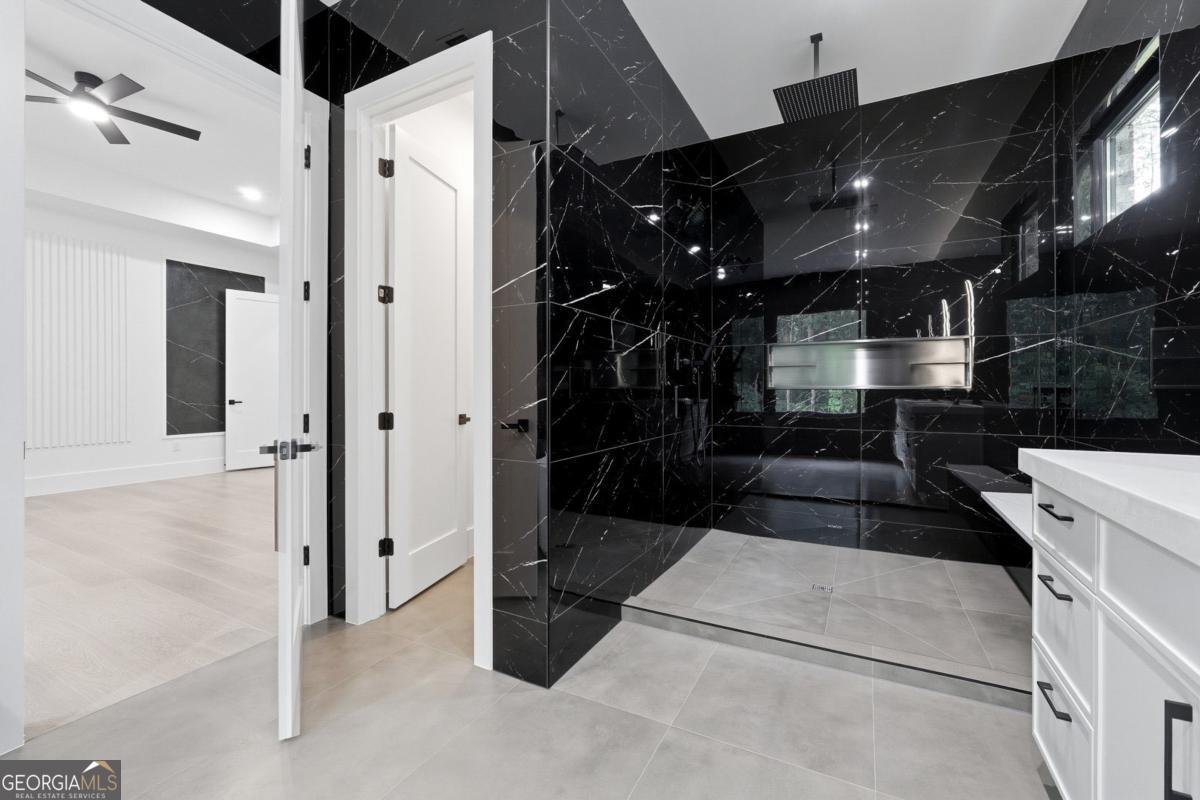 1563 Whitley Road Bethlehem, GA 30620 - Photo 20 of 44 a picture of a bathroom with a glass door shower