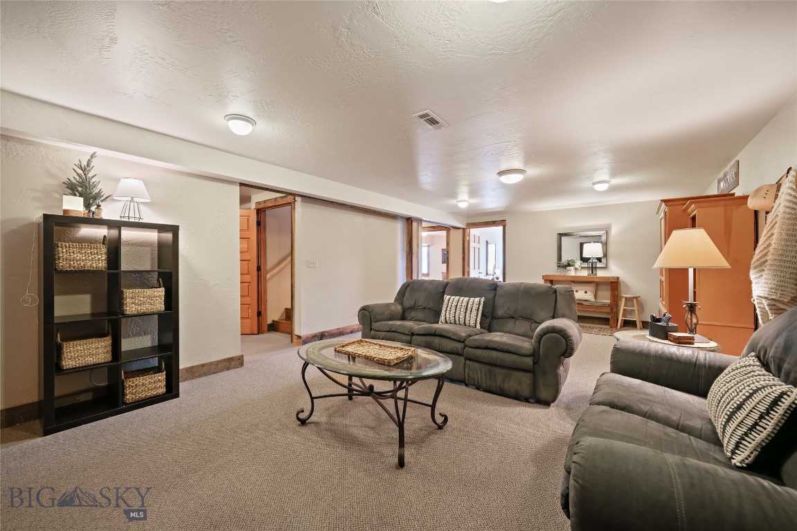 1460 Horseshoe Gulch Road Manhattan, MT 59741 - Photo 77 of 99 Basement Living Room
