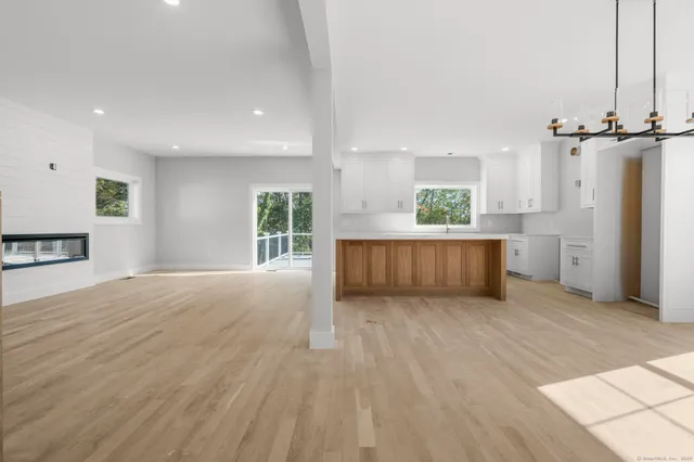 a view of a kitchen with furniture and a window