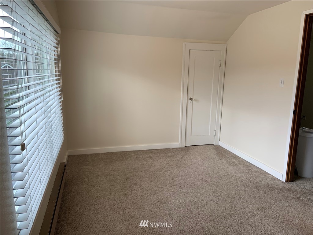 129 Wells Avenue North Renton, WA 98057 - Photo 26 of 29 a view of an empty room and a window