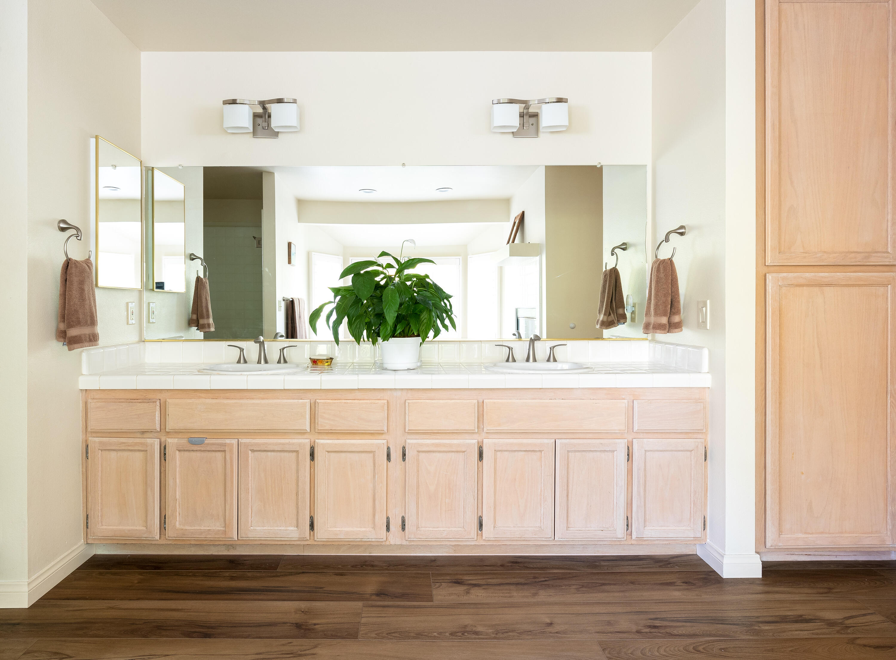 352 Nykobing Solvang, CA 93463 - Photo 11 of 27 a bathroom with a sink and a mirror