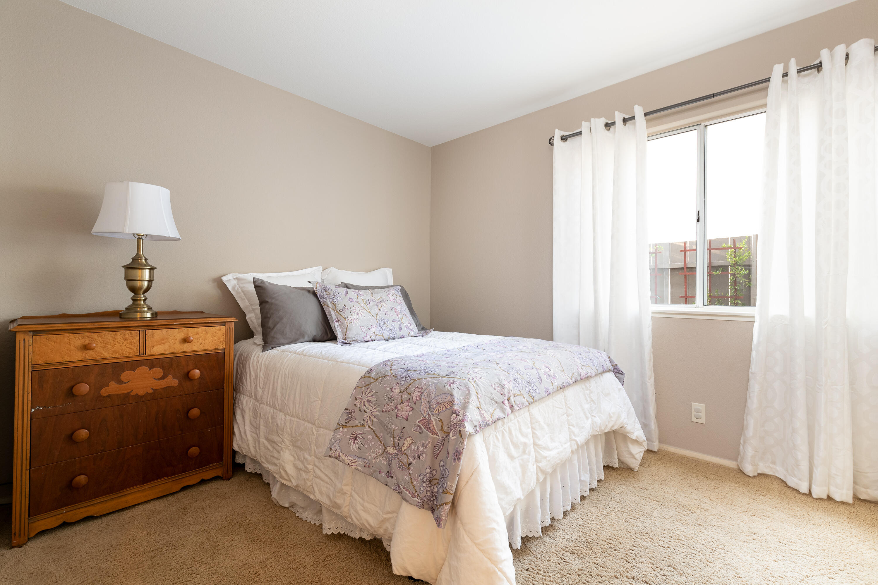 352 Nykobing Solvang, CA 93463 - Photo 14 of 27 a bedroom with a bed and a window