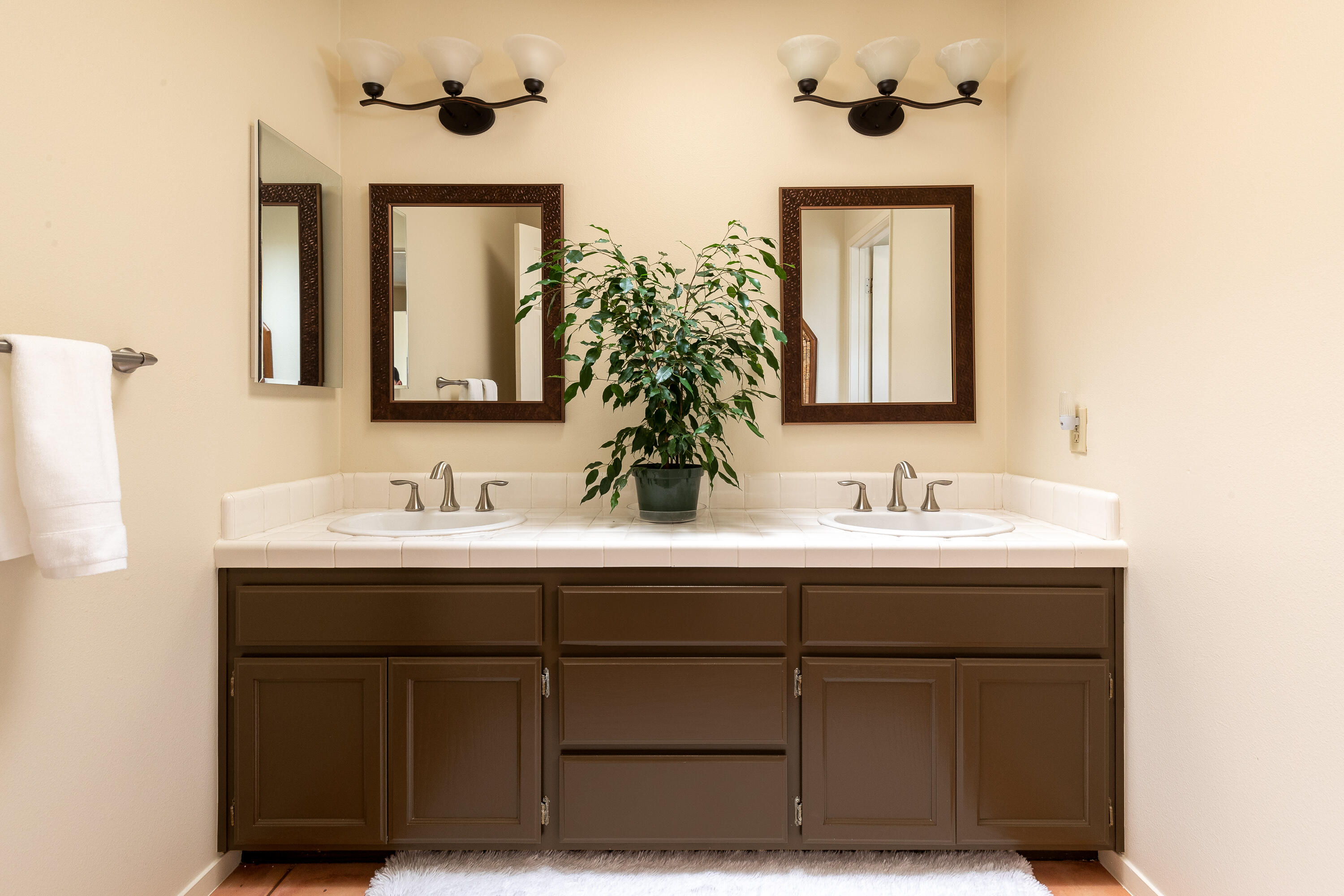 352 Nykobing Solvang, CA 93463 - Photo 15 of 27 a bathroom with a sink and a mirror