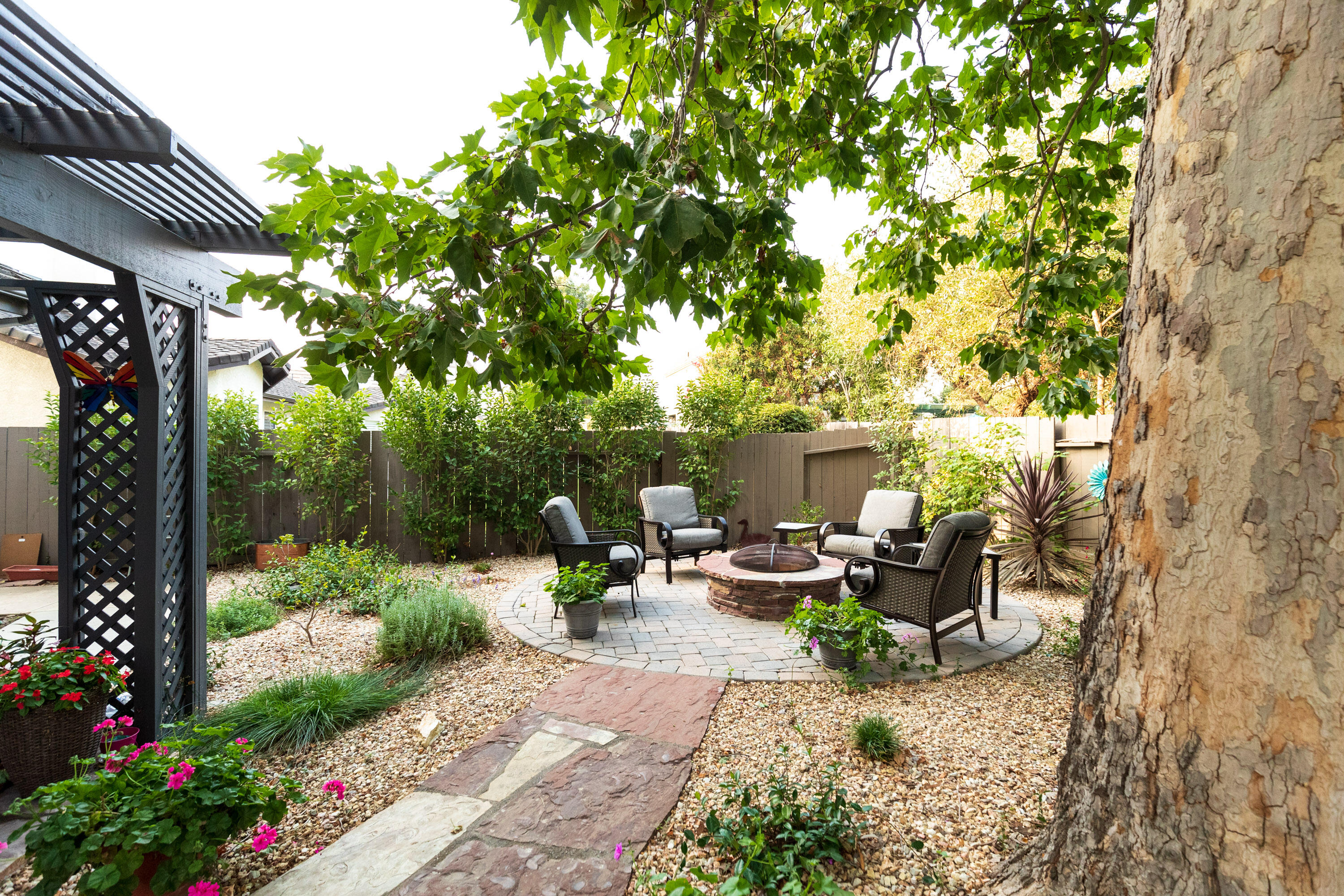352 Nykobing Solvang, CA 93463 - Photo 20 of 27 a view of backyard with outdoor seating and plants