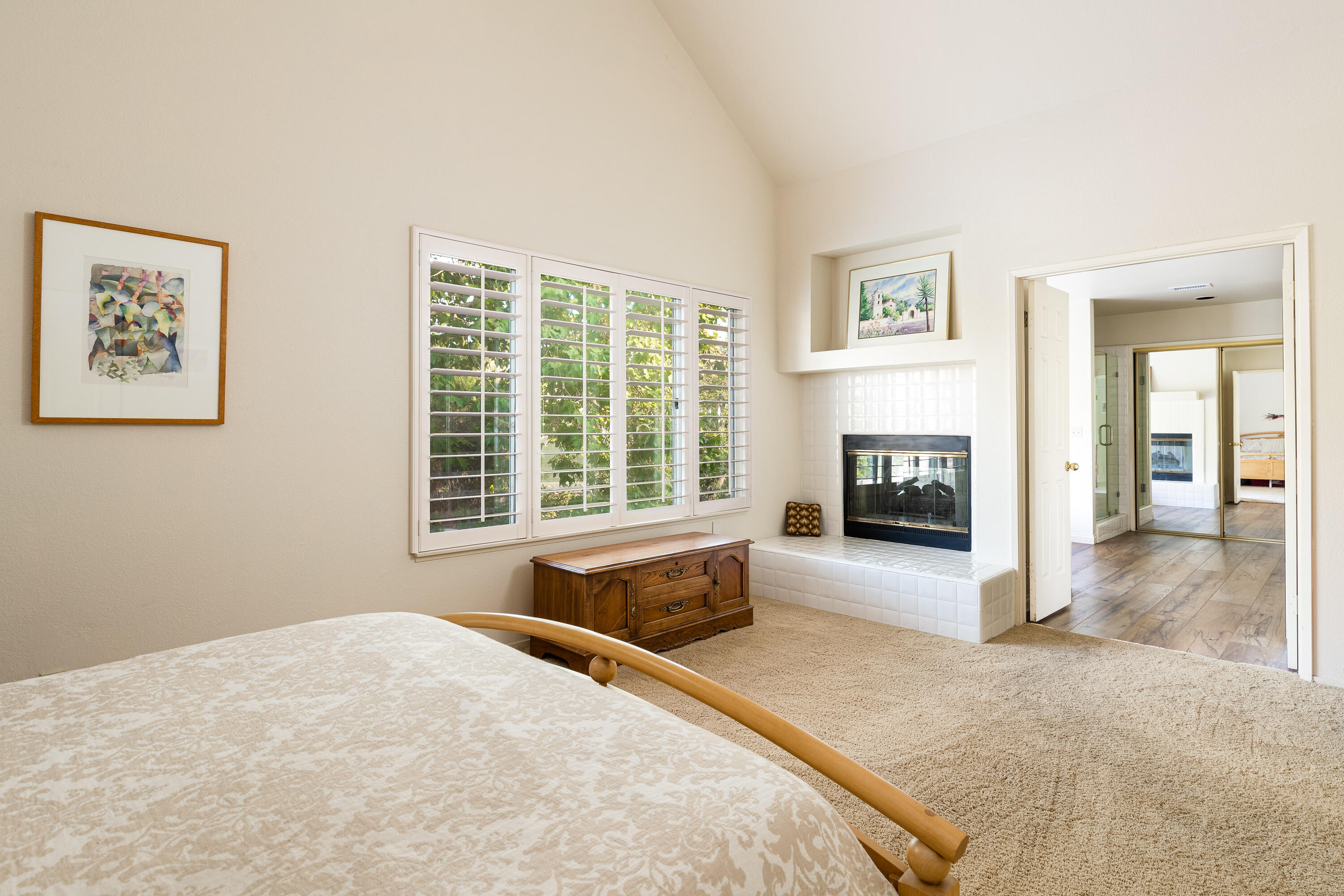 352 Nykobing Solvang, CA 93463 - Photo 10 of 27 a spacious bedroom with a bed and a fireplace