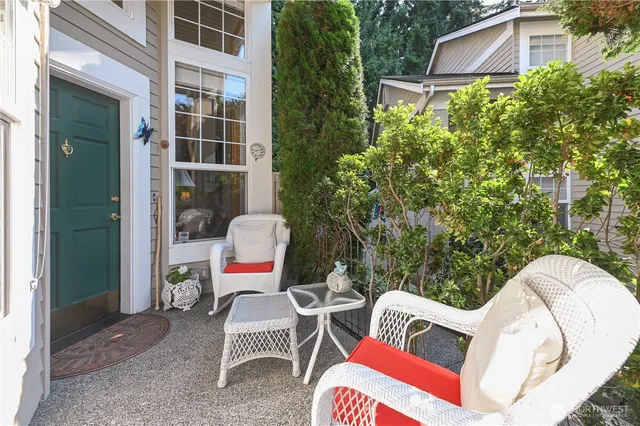 a backyard of a house with seating space