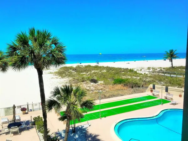 a view of a yard with furniture