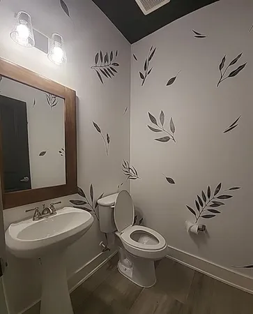 an empty room with wooden floor