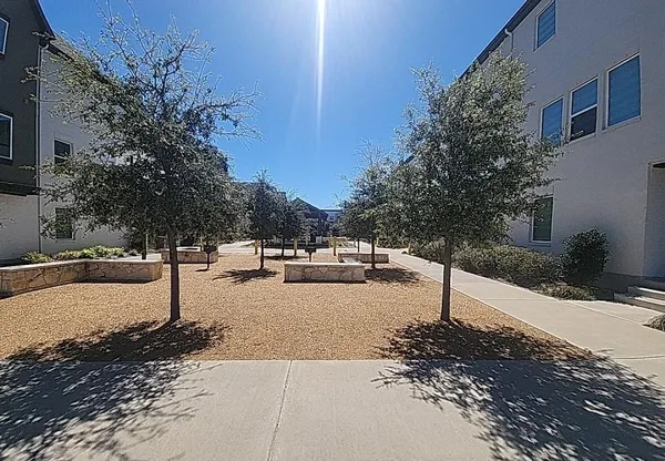 a street view with tall buildings
