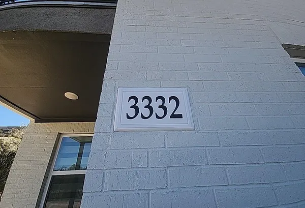 a bathroom with a shower and a sink