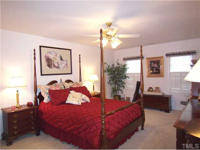 9101 Kettner Court Raleigh, NC 27615 - Photo 16 of 25 The spacious Master Suite features neutral carpet, CF, lg WIC & lg private Bath. Master Bedroom