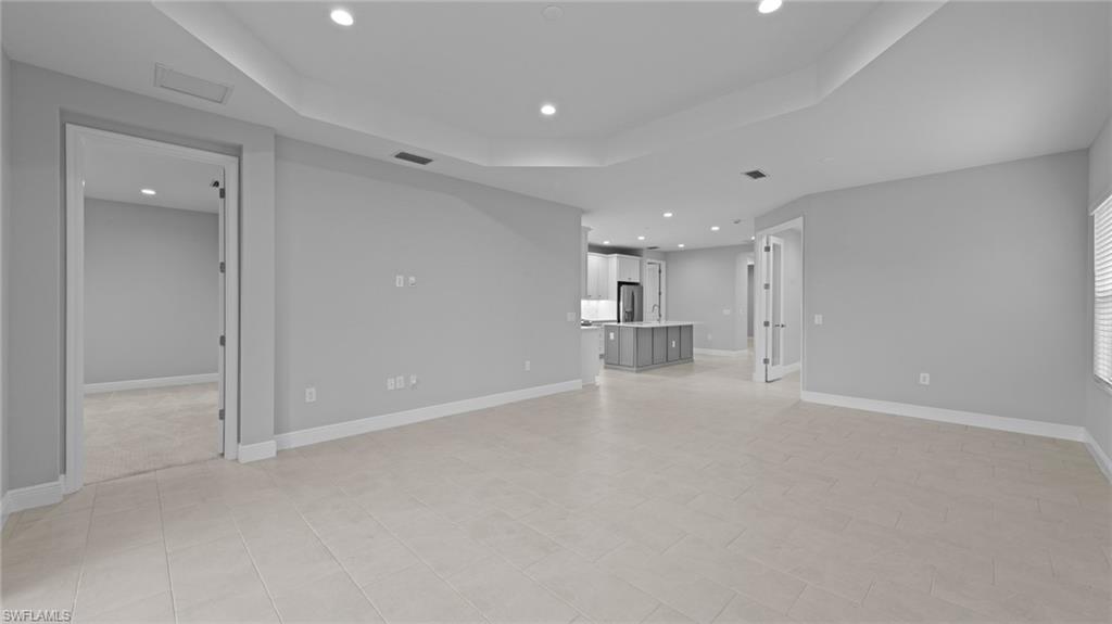 4636 Skysail Drive Naples, FL 34120 - Photo 13 of 46 a view of empty room