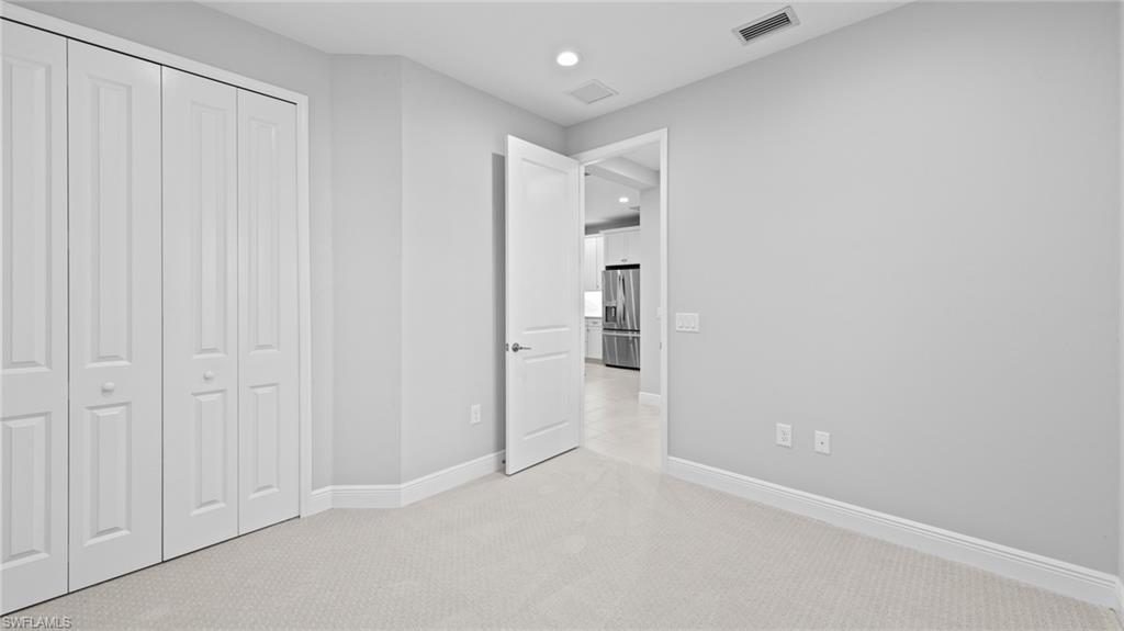 4636 Skysail Drive Naples, FL 34120 - Photo 16 of 46 a view of an empty room