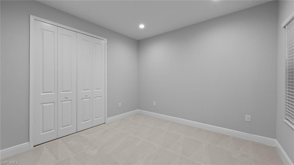 4636 Skysail Drive Naples, FL 34120 - Photo 17 of 46 a view of an empty room