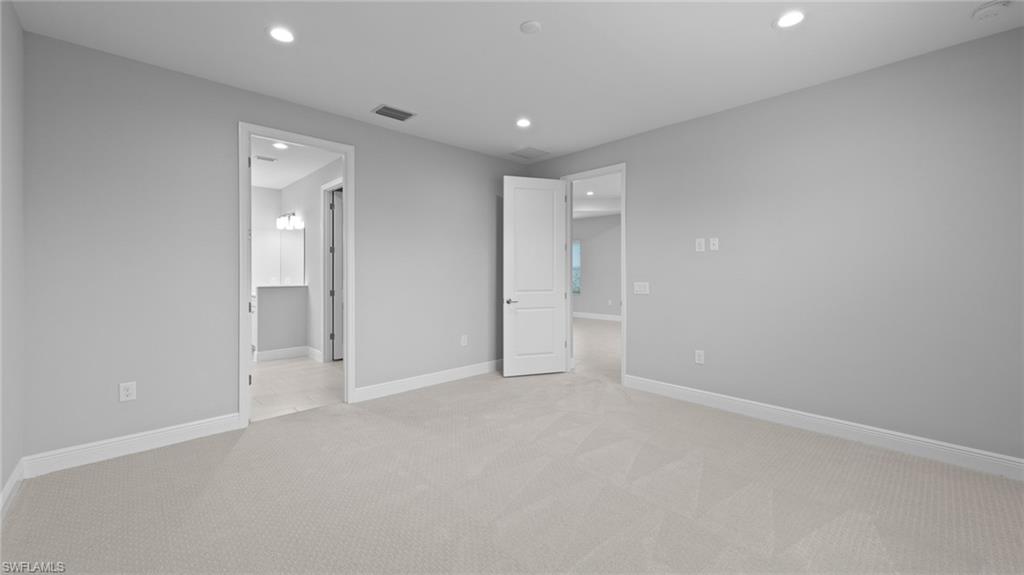 4636 Skysail Drive Naples, FL 34120 - Photo 22 of 46 a view of an empty room