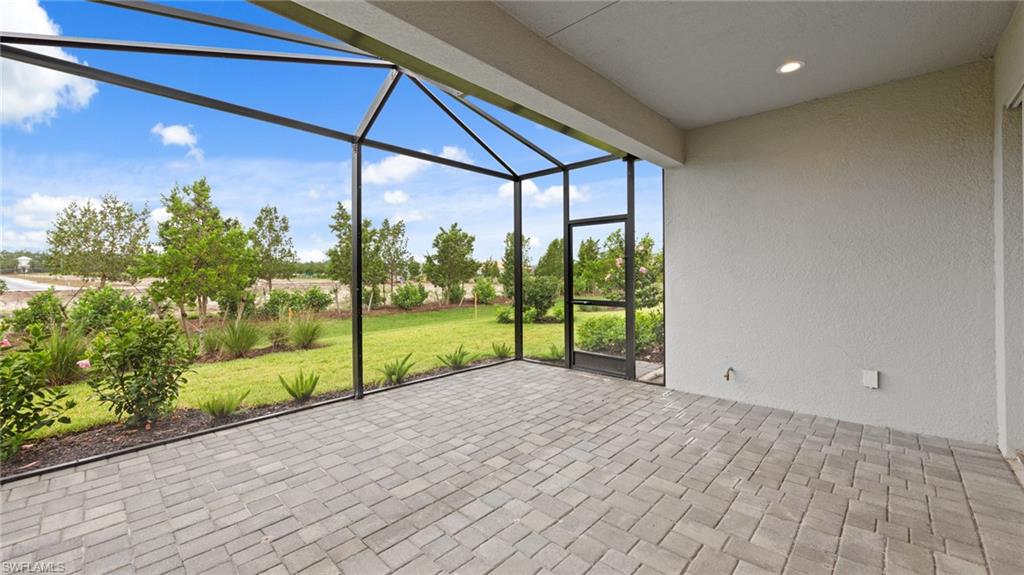 4636 Skysail Drive Naples, FL 34120 - Photo 28 of 46 a view of an empty room and window