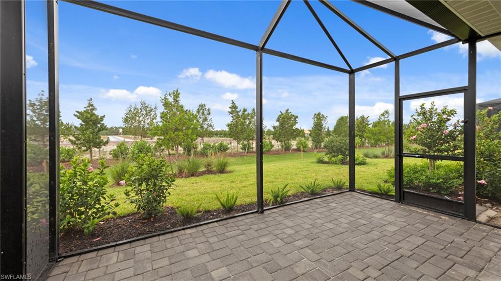 4636 Skysail Drive Naples, FL 34120 - Photo 30 of 46 a view of an outdoor space and deck