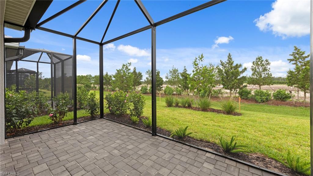 4636 Skysail Drive Naples, FL 34120 - Photo 31 of 46 a view of a porch with a yard