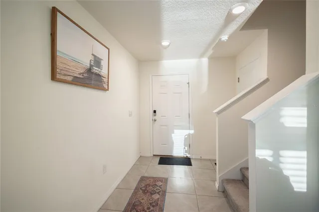 a view of entryway with white walls
