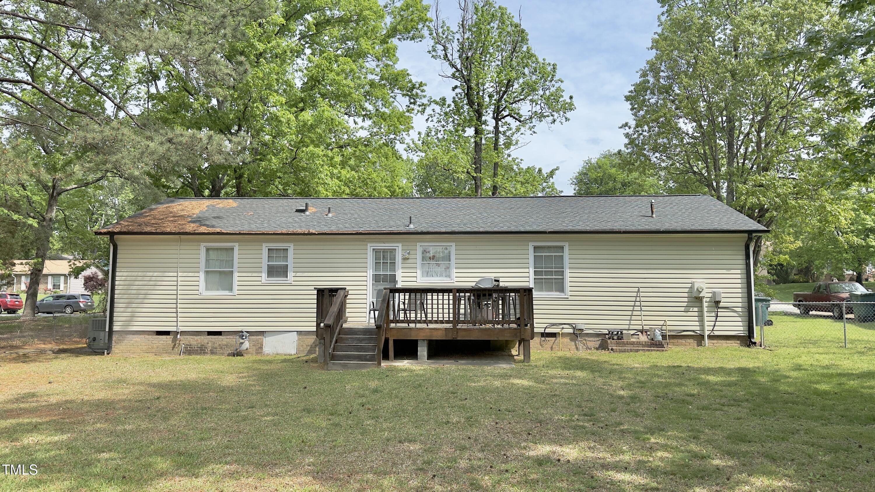 1011 Wyldewood Road Durham, NC 27704 - Photo 4 of 18 front view of a house with a yard