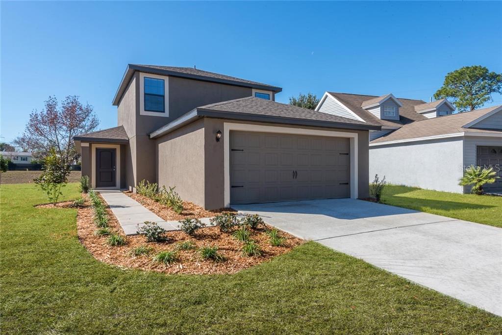 a front view of house with yard