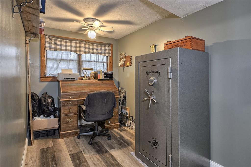 3456 Country Club Road Mount Pleasant, PA 15666 - Photo 26 of 39 a view of a workspace with furniture and a window