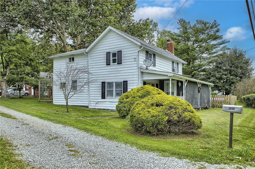 3456 Country Club Road Mount Pleasant, PA 15666 - Photo 3 of 39 a view of a house with a yard