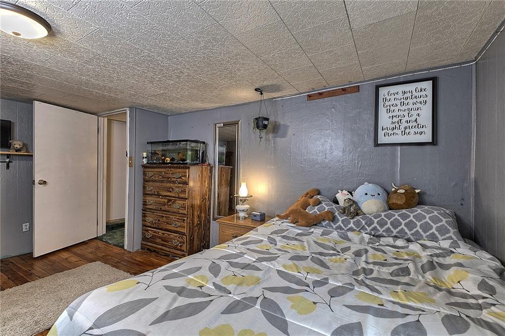 3456 Country Club Road Mount Pleasant, PA 15666 - Photo 33 of 39 a bedroom with a bed and a closet